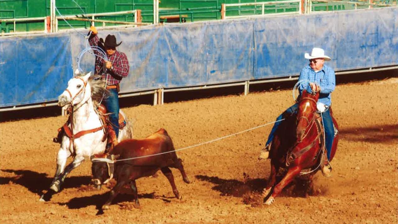 John (right), ridden by owner Doug Parker, overcame botulism poisoning to qualify for the World Series of Team Roping. John, an 11-year-old American Quarter Horse gelding