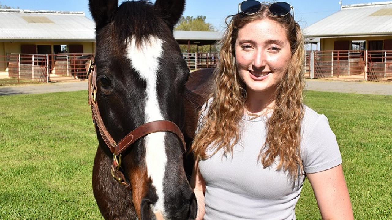 UC Davis undergraduate student Samantha Gentille and CEH herd horse April.