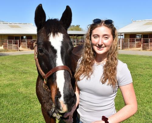 UC Davis undergraduate student Samantha Gentille and CEH herd horse April.